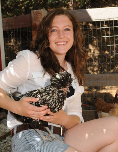 senior with chicken