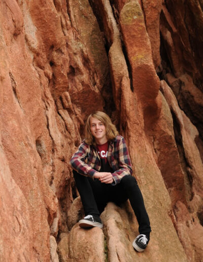 senior on red rocks