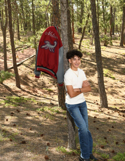 senior photo with letterman jacket