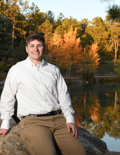 senior photo by water