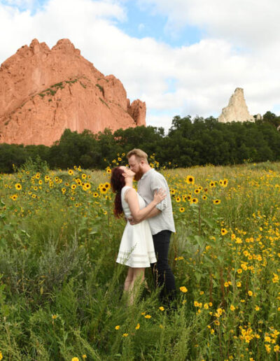 kissing in a field of wildflowers