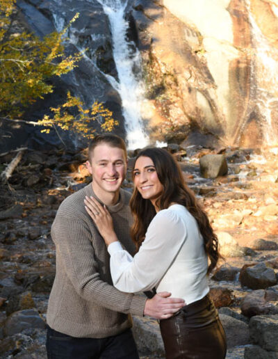 engagement photos in front of waterfall